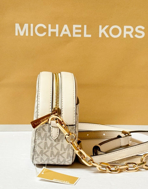 Load image into Gallery viewer, MICHAEL KORS JET SET GLAM SMALL FRONT POCKET OVAL CROSSBODY BAG MK LIGHT CREAM
